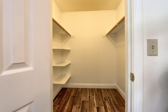 42177 Lone Olive Ln, Ahwahnee, CA 93601 - walk in closet featuring wood tiled floors
