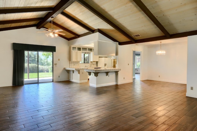 42177 Lone Olive Ln, Ahwahnee, CA 93601 - unfurnished living room featuring a chandelier, wood ceiling, a ceiling fan, beamed ceiling, and dark wood-style flooring