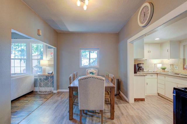 431 S Laurel, Turlock, CA 95380 - dining space with light wood finished floors and baseboards