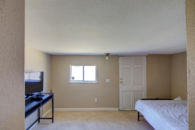 431 S Laurel, Turlock, CA 95380 - carpeted bedroom featuring a textured ceiling and baseboards