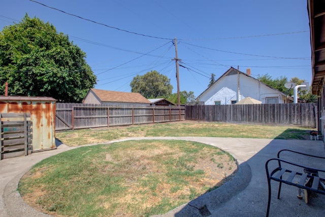 431 S Laurel, Turlock, CA 95380 - view of yard with a storage unit, an outdoor structure, and a patio area