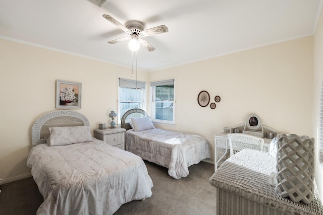 bedroom featuring carpet floors, crown molding, ceiling fan, and baseboards