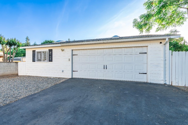 detached garage with fence