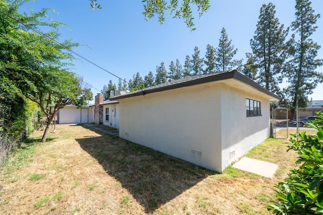 view of side of home with crawl space
