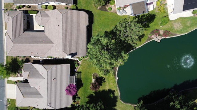 aerial view of property's location featuring a nearby body of water