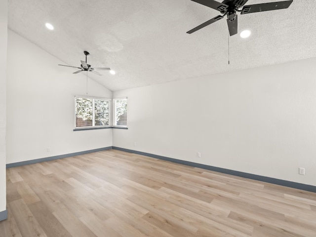 4038 W San Jose Ave, Fresno, CA 93722 - spare room featuring a ceiling fan, a textured ceiling, lofted ceiling, light wood-style flooring, and baseboards