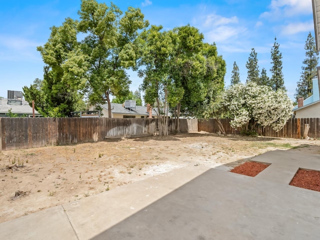4038 W San Jose Ave, Fresno, CA 93722 - fenced backyard with a patio