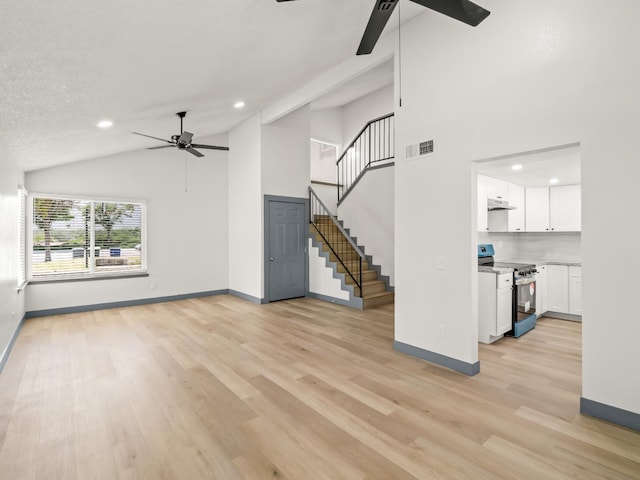 4038 W San Jose Ave, Fresno, CA 93722 - unfurnished living room with ceiling fan, baseboards, stairway, light wood-style floors, and recessed lighting