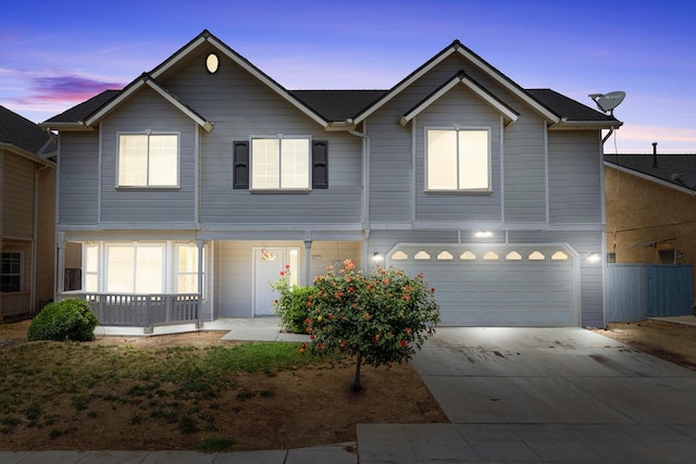 6371 N Babigian Ave, Fresno, CA 93722 - townhome / multi-family property featuring driveway, a garage, and fence