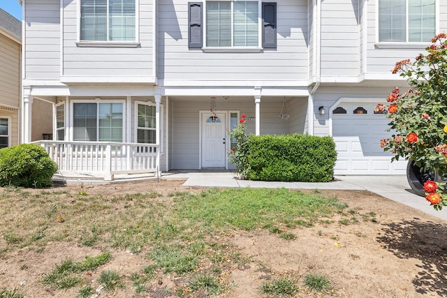 6371 N Babigian Ave, Fresno, CA 93722 - view of front of house featuring a garage