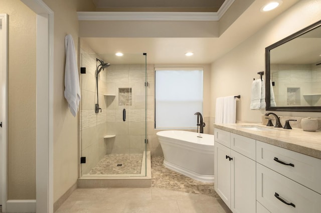 525 E Shelldrake Cir, Fresno, CA 93730 - full bathroom with a freestanding tub, a shower stall, vanity, crown molding, and recessed lighting