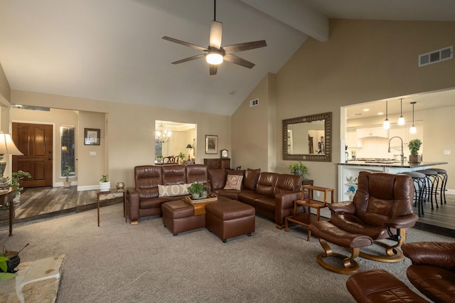 525 E Shelldrake Cir, Fresno, CA 93730 - living area with carpet, high vaulted ceiling, a ceiling fan, a chandelier, and beam ceiling