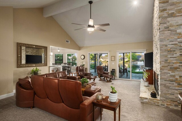 525 E Shelldrake Cir, Fresno, CA 93730 - living room featuring carpet, ceiling fan, beamed ceiling, high vaulted ceiling, and a fireplace