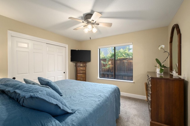 525 E Shelldrake Cir, Fresno, CA 93730 - bedroom with carpet flooring, baseboards, a closet, and a ceiling fan