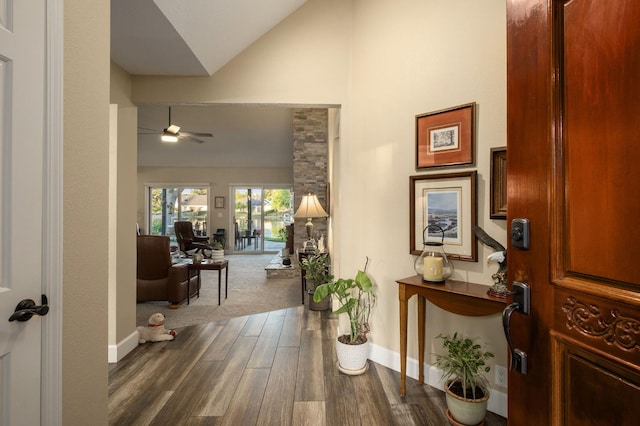 525 E Shelldrake Cir, Fresno, CA 93730 - hall with dark wood finished floors, baseboards, and high vaulted ceiling