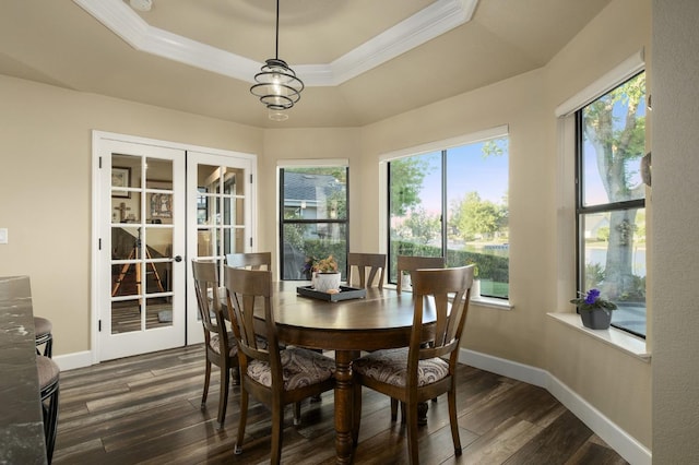 525 E Shelldrake Cir, Fresno, CA 93730 - dining room with a tray ceiling, dark wood-type flooring, crown molding, french doors, and baseboards