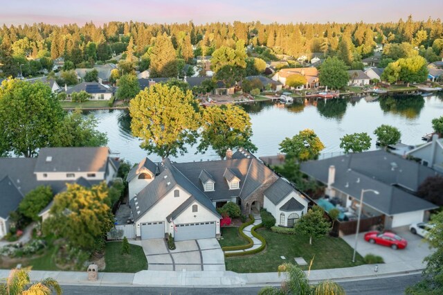 525 E Shelldrake Cir, Fresno, CA 93730 - aerial view of residential area with a nearby body of water