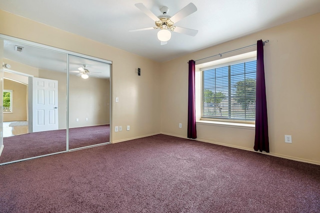 37086 Marciel Ave, Madera, CA 93636 - unfurnished bedroom with multiple windows, carpet, a closet, and baseboards