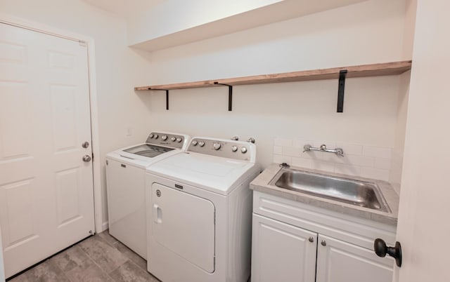 1079 E El Paso Ave, Fresno, CA 93720 - laundry room with independent washer and dryer and cabinet space