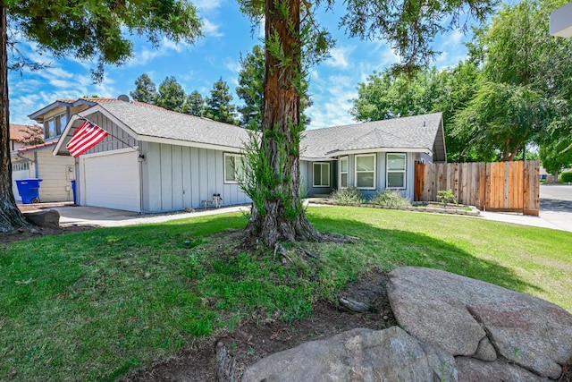 1079 E El Paso Ave, Fresno, CA 93720 - ranch-style home featuring board and batten siding and an attached garage