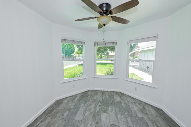 1079 E El Paso Ave, Fresno, CA 93720 - unfurnished room with wood finished floors and ceiling fan