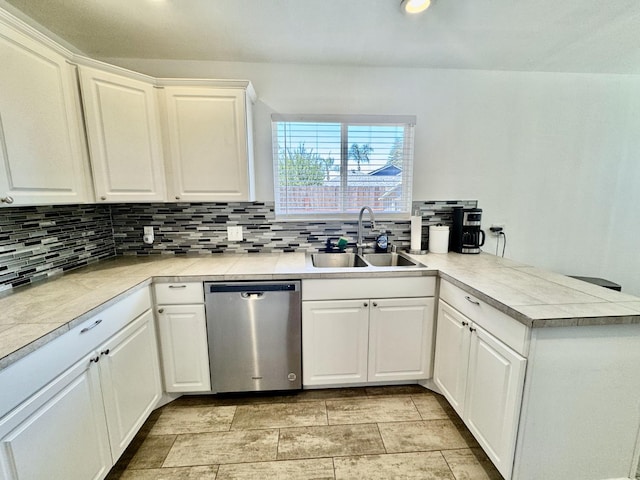 1079 E El Paso Ave, Fresno, CA 93720 - kitchen with dishwasher, a sink, a peninsula, tasteful backsplash, and recessed lighting