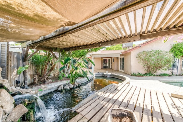 6211 N Cleo Ave, Fresno, CA 93722 - deck with a garden pond