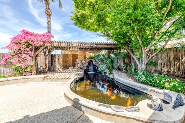 6211 N Cleo Ave, Fresno, CA 93722 - exterior view of a garden pond