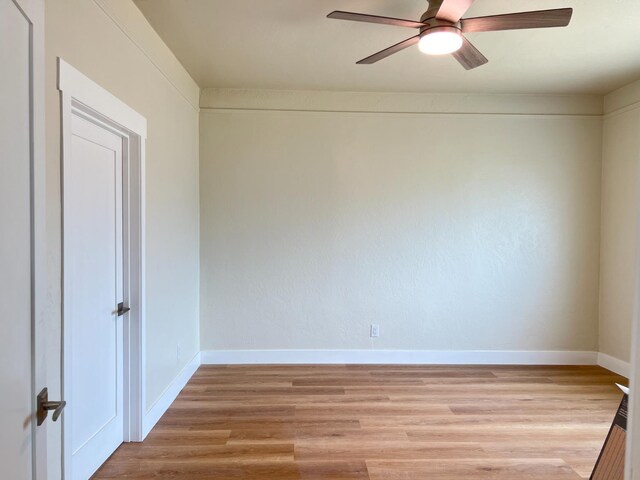 7013 N Maroa Ave, Pinedale, CA 93650 - spare room featuring a ceiling fan, light wood-type flooring, and baseboards