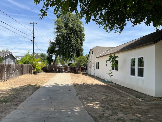 7013 N Maroa Ave, Pinedale, CA 93650 - fenced backyard featuring a patio area