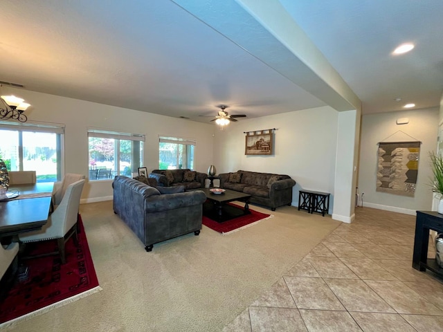 2604 W Taylor, Visalia, CA 93291 - living room with light tile patterned floors, light carpet, baseboards, ceiling fan, and recessed lighting