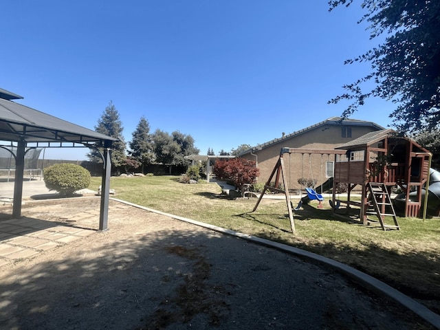 2604 W Taylor, Visalia, CA 93291 - view of grassy yard featuring a playground and a gazebo