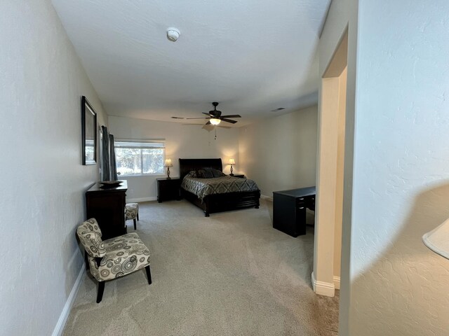 2604 W Taylor, Visalia, CA 93291 - carpeted bedroom featuring ceiling fan and baseboards