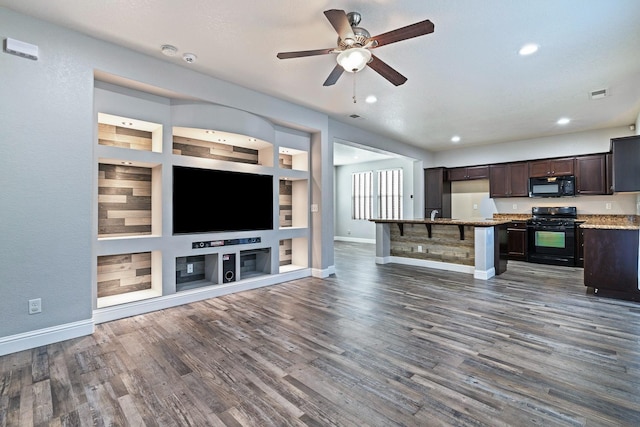 unfurnished living room featuring dark wood finished floors, baseboards, ceiling fan, and recessed lighting