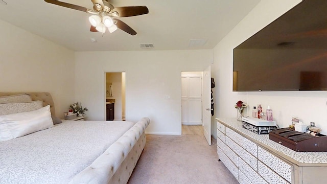 290 Cabrillo Dr, Coalinga, CA 93210 - bedroom featuring light colored carpet, baseboards, and a ceiling fan