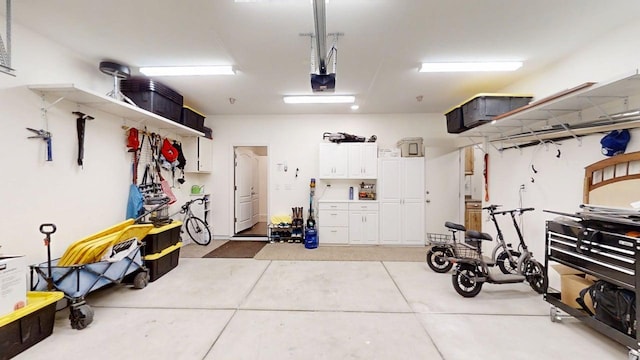 290 Cabrillo Dr, Coalinga, CA 93210 - garage featuring a garage door opener