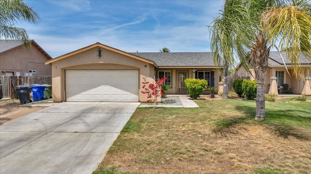 1601 El Paso, Dinuba, CA 93618 - ranch-style house with stucco siding, an attached garage, and driveway