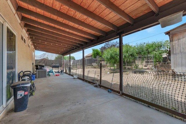 1601 El Paso, Dinuba, CA 93618 - fenced backyard with a patio area and cooling unit