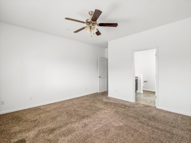 1585 Dallas St, Dinuba, CA 93618 - unfurnished bedroom with carpet flooring, baseboards, and ceiling fan