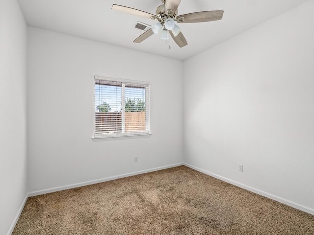 1585 Dallas St, Dinuba, CA 93618 - spare room with carpet flooring, baseboards, and a ceiling fan