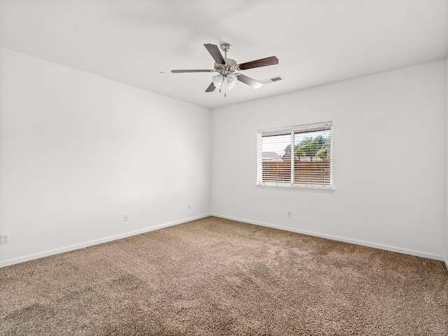 1585 Dallas St, Dinuba, CA 93618 - unfurnished room featuring carpet floors, baseboards, and ceiling fan