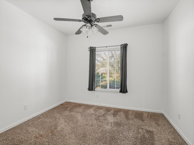 1585 Dallas St, Dinuba, CA 93618 - spare room with carpet floors, baseboards, and a ceiling fan