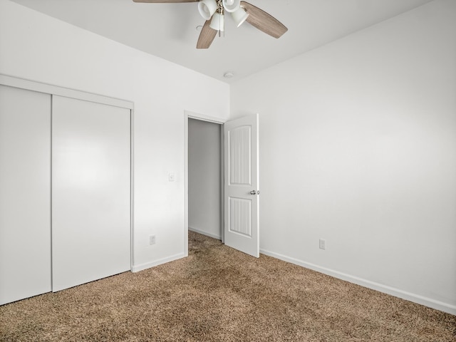 1585 Dallas St, Dinuba, CA 93618 - unfurnished bedroom with carpet, a closet, baseboards, and ceiling fan