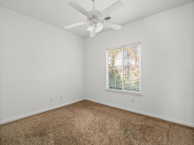 1585 Dallas St, Dinuba, CA 93618 - spare room featuring carpet, baseboards, and ceiling fan