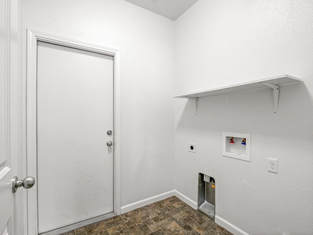1585 Dallas St, Dinuba, CA 93618 - washroom featuring baseboards, washer hookup, stone finish flooring, and hookup for an electric dryer