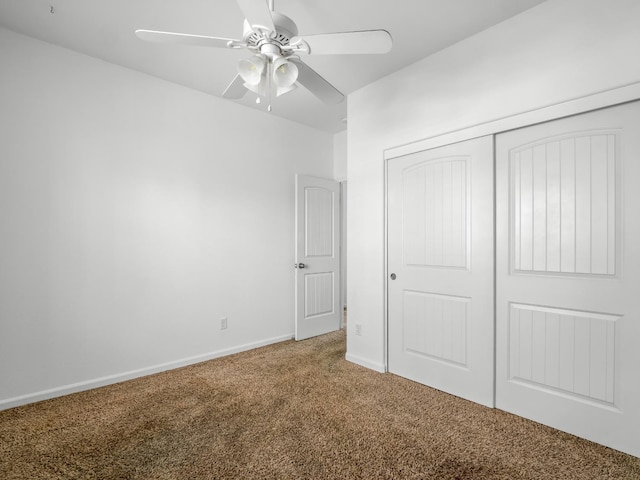 1585 Dallas St, Dinuba, CA 93618 - unfurnished bedroom with carpet, a closet, baseboards, and a ceiling fan