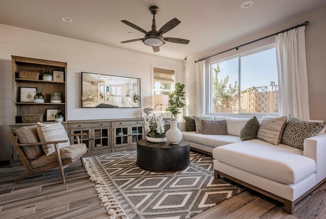 1161 Maclure Ave W, Madera, CA 93636 - living room featuring wood finished floors, ceiling fan, and recessed lighting