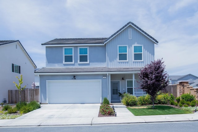 324 Sunset Dr S, Madera, CA 93636 - traditional-style home with fence, driveway, a porch, and an attached garage
