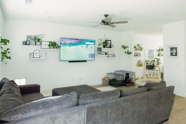 324 Sunset Dr S, Madera, CA 93636 - living area featuring light wood-type flooring, a ceiling fan, and baseboards