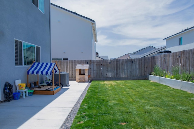 324 Sunset Dr S, Madera, CA 93636 - view of yard featuring a patio area and central AC